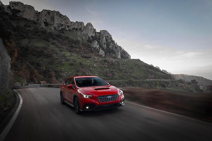 2024 Subaru WRX TR driving on a windy road