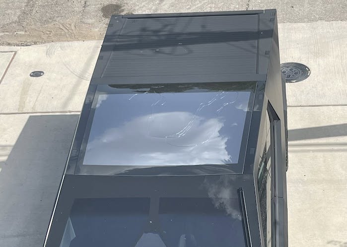 Tesla Cybertruck top view with broken roof galss