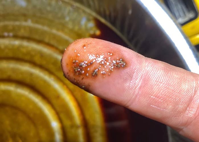 Tony's 2024 Toyota Tundra with metal chunks in the drainpan