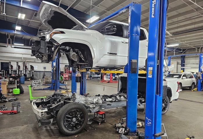Ernie's 2024 Toyota Tundra with the cab off at the Toyota dealer