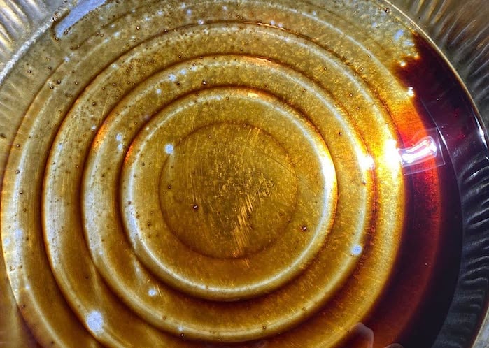 Tony's 2024 Toyota Tundra oil drain pan with metal shavings