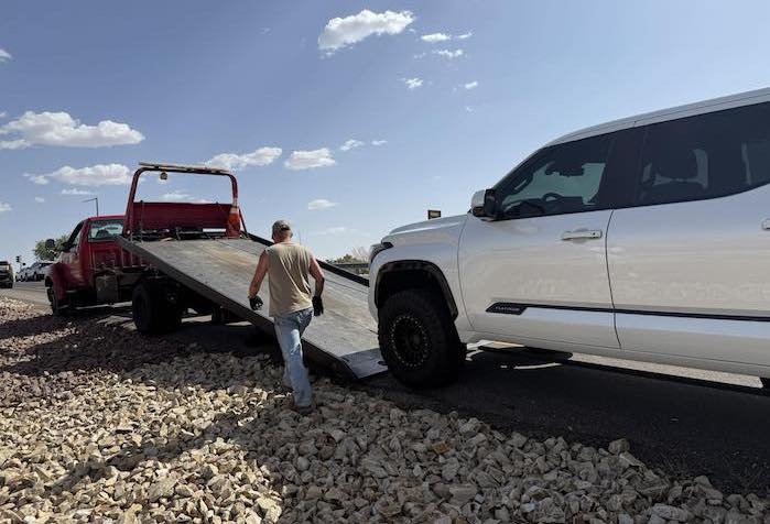 Raymond's 2024 Toyota Tundra being towed