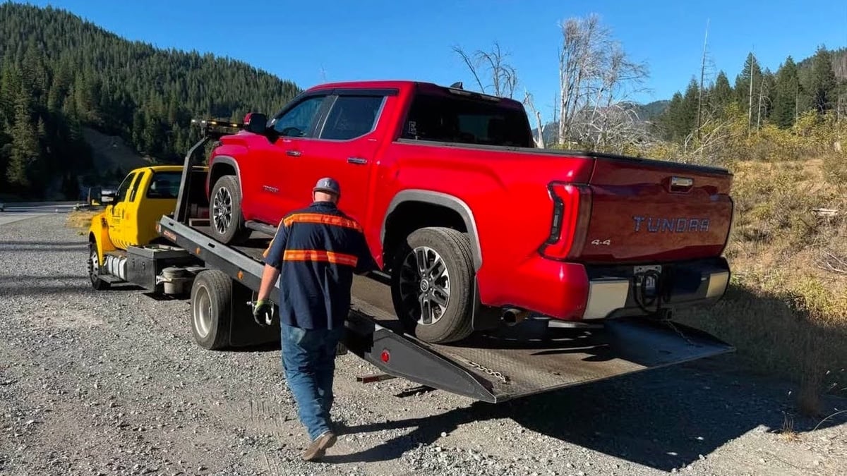 2024 Toyota Tundra being loaded onto a tow truck after engine failure in Shasta Lake, CA