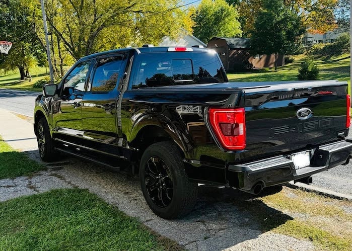 Barry's 2025 Ford F-150 in his driveway rear view
