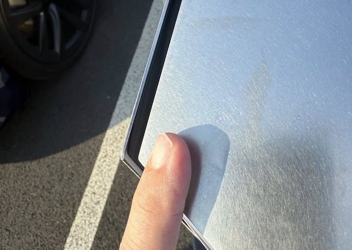 Nate showing the 2025 Tesla Cybertruck's panel gaps