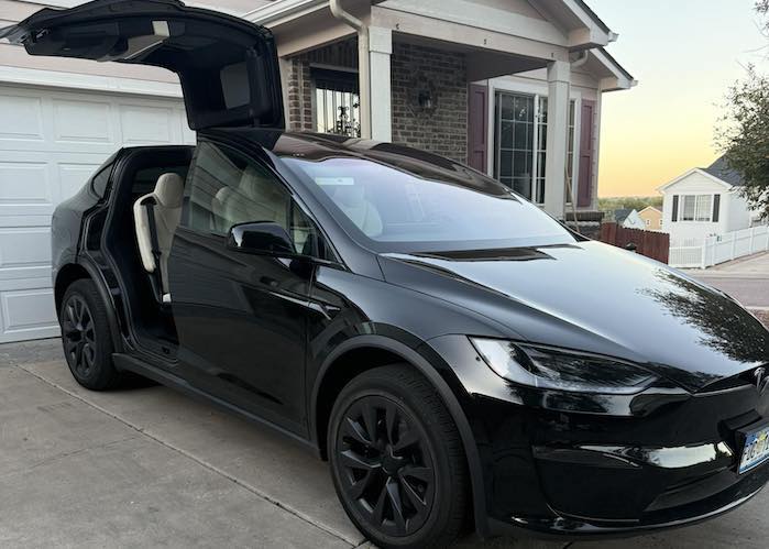 2025 Tesla Model X in Dennis's driveway