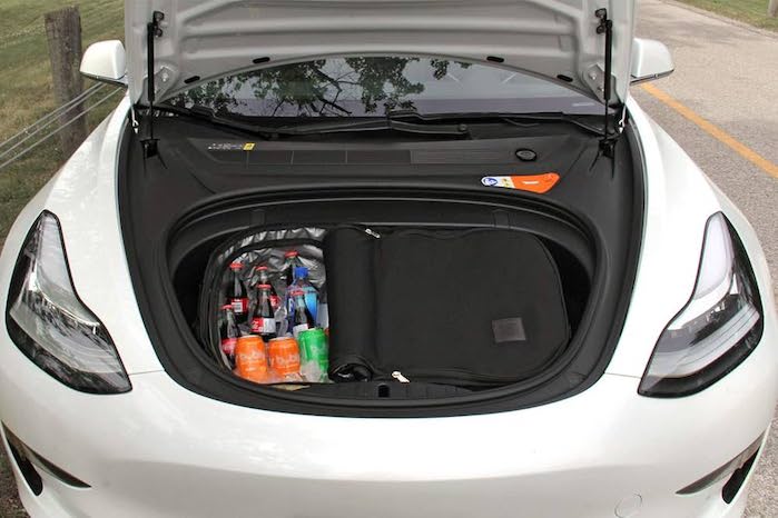 Kevin's Tesla Model Y and a Tesla cooler from Amazon