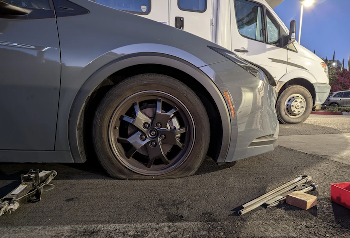 2025 Toyota Prius with a flat tire