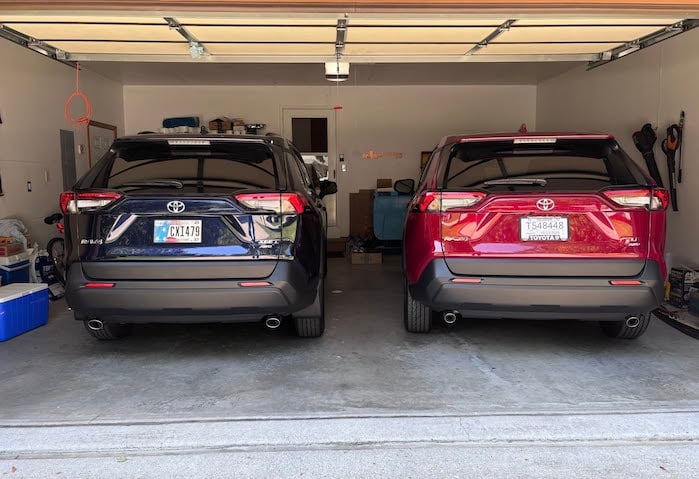 Jerry and his wife's Toyota RAV4s in the garage