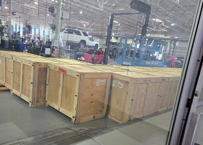 Toyota engines in crates at the dealer's service department