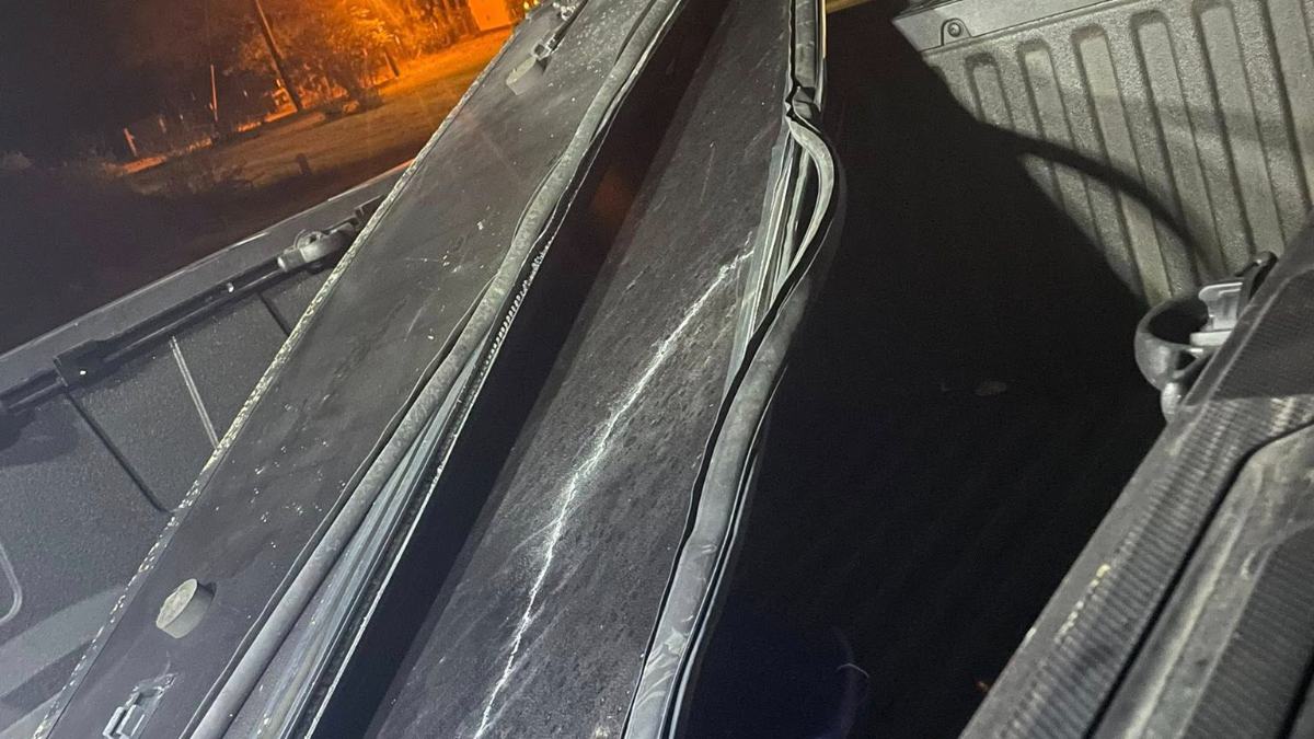Close-up detail shot of damaged truckbed