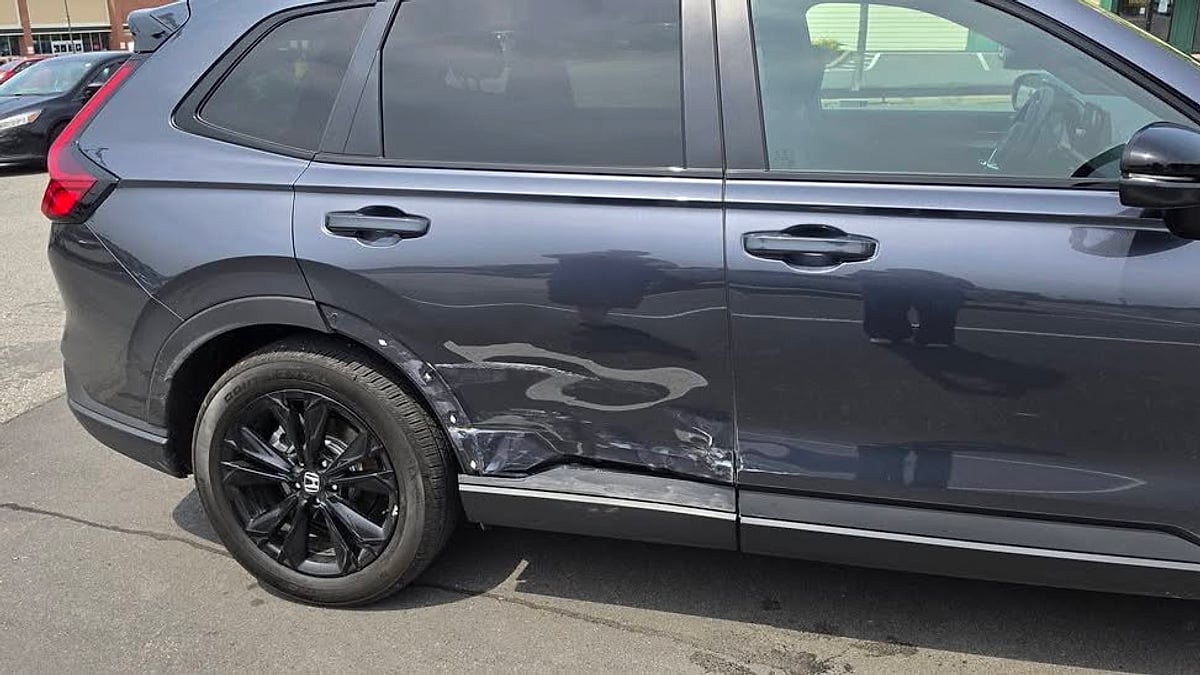 2025 Honda CR-V Hybrid with body damage at the collision center