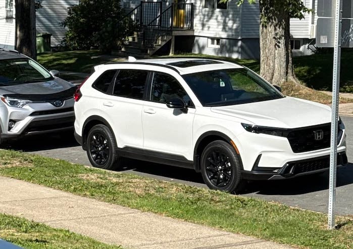Danny Roy's 2026 Honda CR-V Hybrid in front of his house