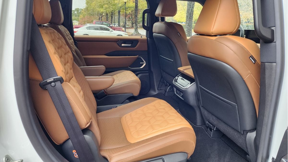 2026 Nissan Armada Platinum Reserve's interior, quiet leather upholstery and touchscreen infotainment
