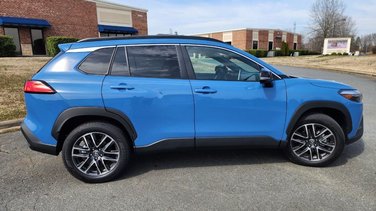 2026 Toyota Corolla Cross Cavalry Blue with 18-inch dark gray wheel design