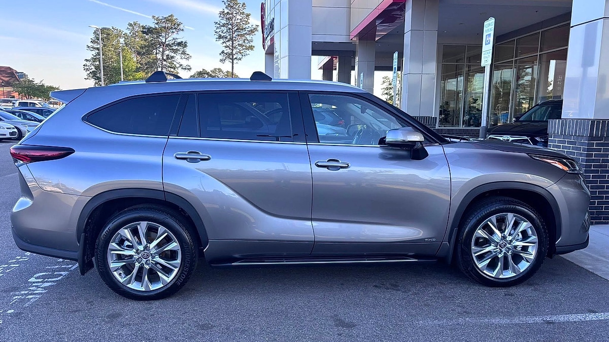 2026 Toyota Highlander parked in the dealer's pre-delivery lane