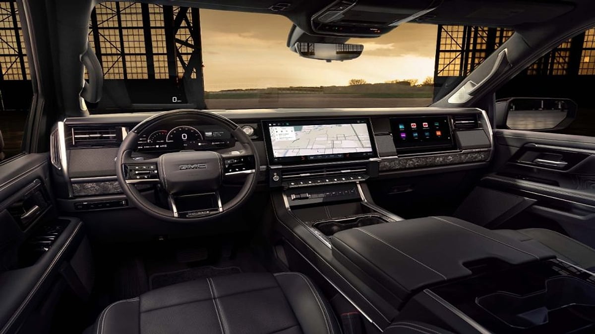 2027 GMC Sierra 1500 Denali Ultimate Stealth Black interior with Bright White accents. Interior full instrument panel.