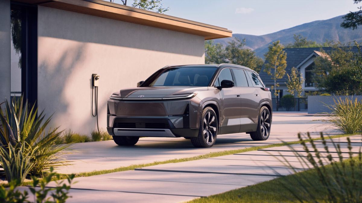 2027 Toyota Highlander EV charging at a residence