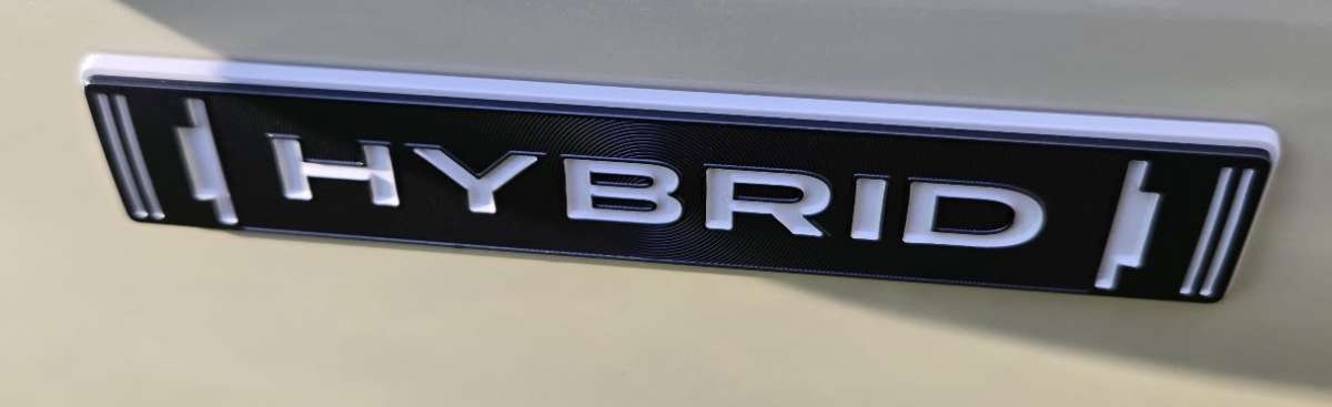 Subaru's Hybrid logo is shown