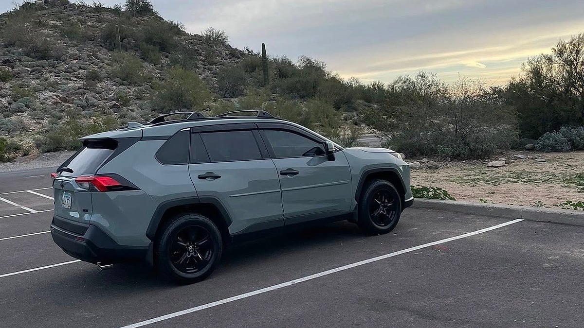 A 2024 Toyota RAV4 rests at a desert trailhead near Phoenix, Arizona, ready for an outdoor adventure