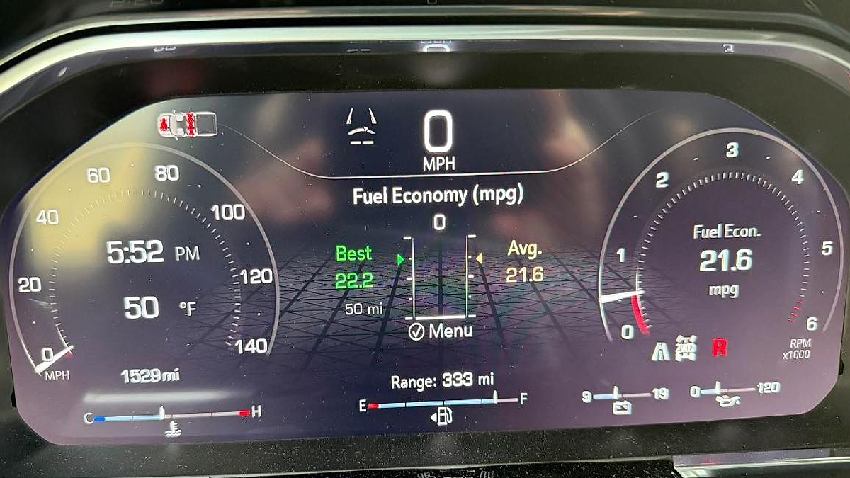A 2026 GMC Sierra instrument dashboard cluster showing the fuel economy after installing the Range Module