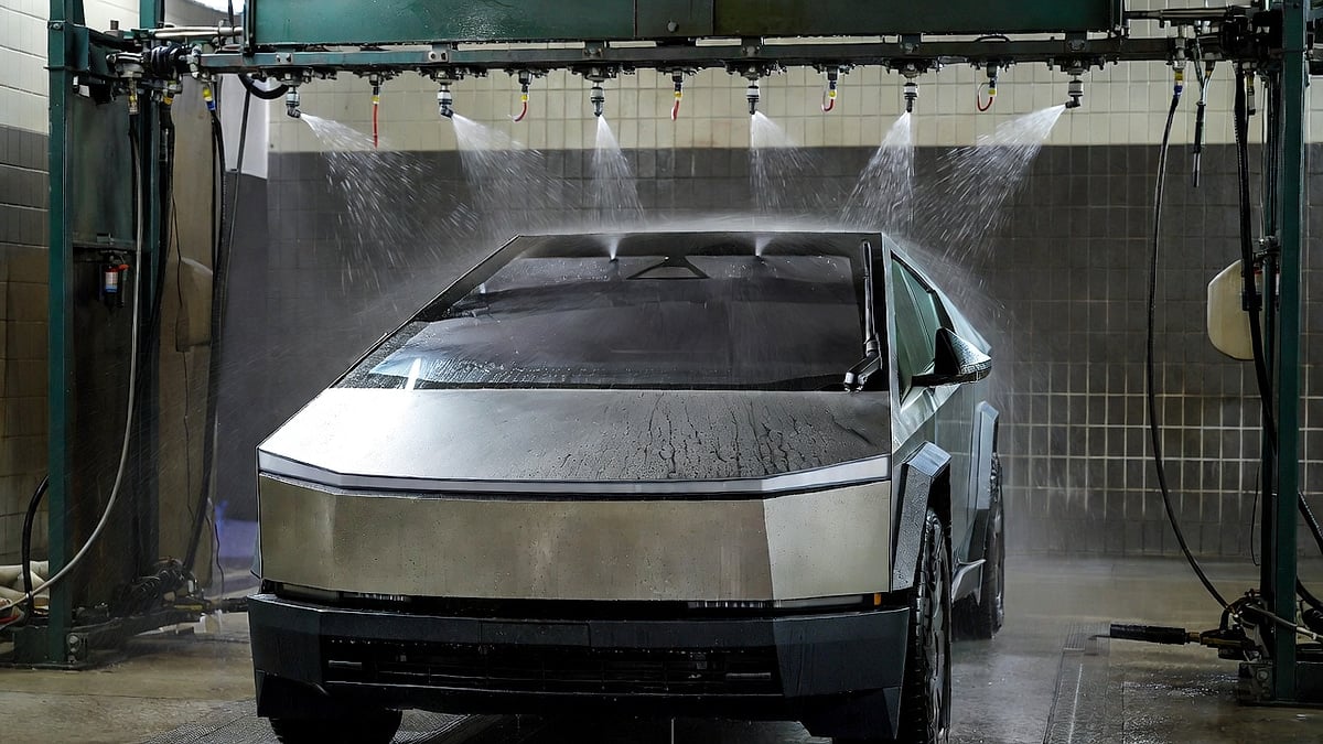 A Tesla Cybertruck in a touchless automatic car wash