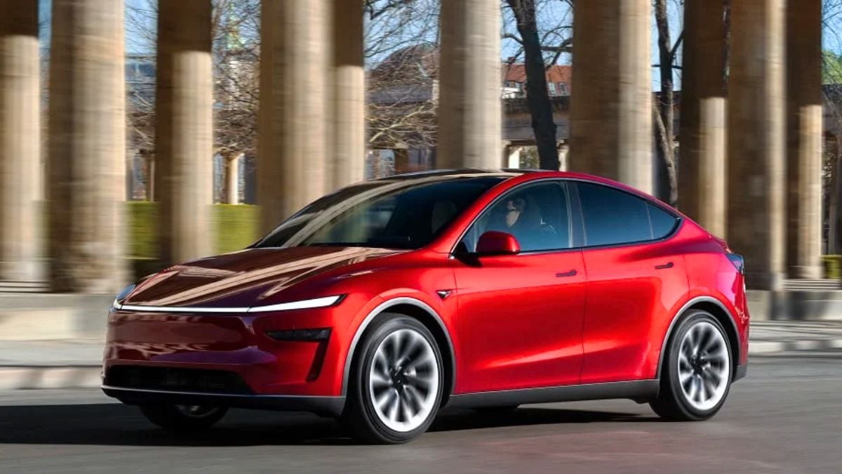 A read Tesla Model Y driving on the roads somewhere in USA