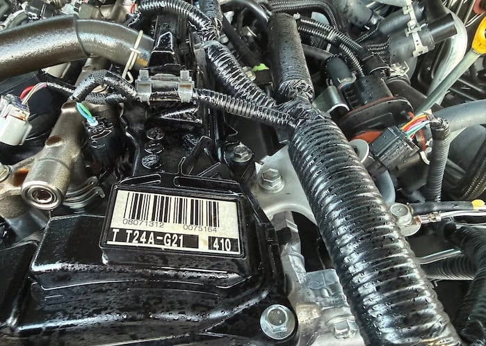 Angie's 2025 Toyota 4Runner with oil in the engine bay