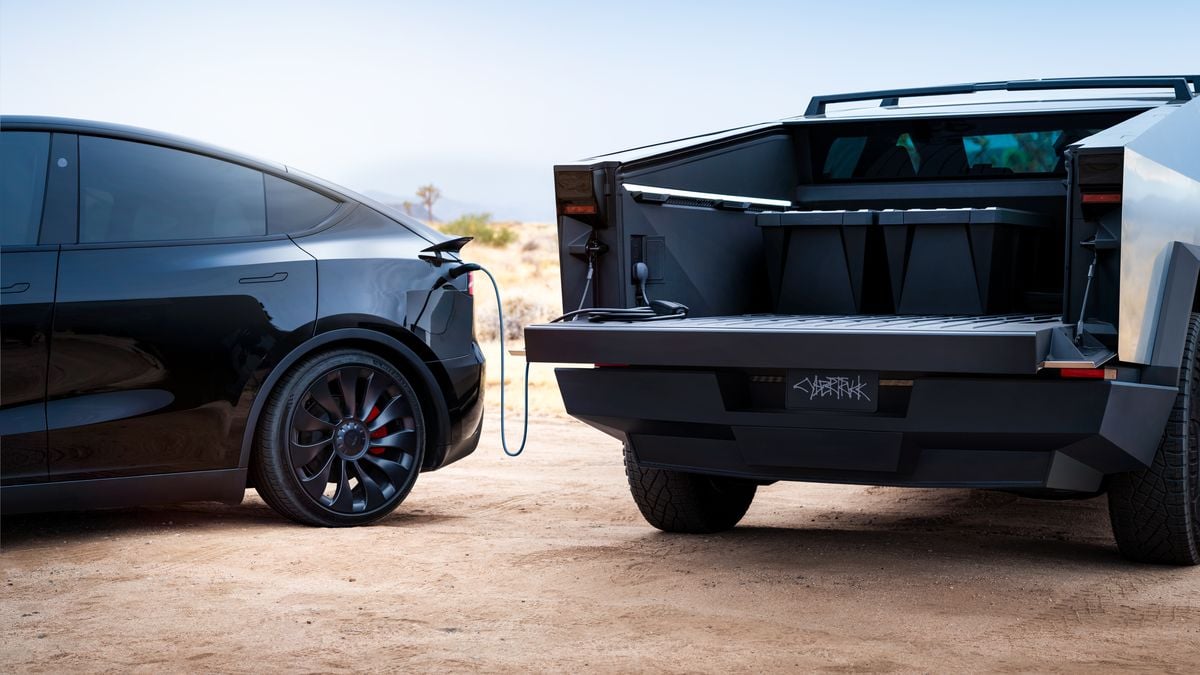 A 2026 Tesla Cybertruck Charges a Black Tesla Model X