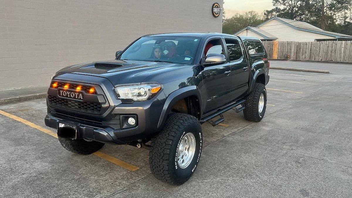 Eriberto Soto's lifted 2019 Toyota Tacoma parked behind the car was in Texas