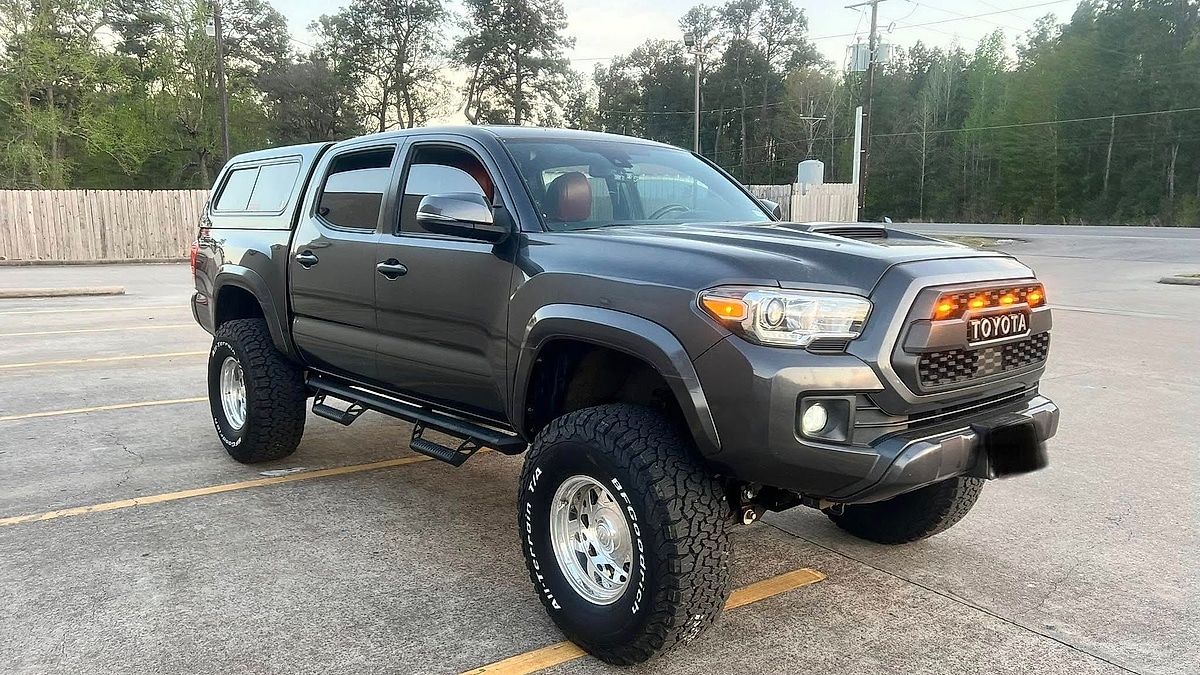 Eriberto Soto's lifted 2019 Toyota Tacoma parked in a parking lot in Houston, Texas