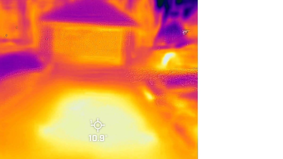 Thermal camera image of driveway after Ford F-150 Lightning was charged in the cold