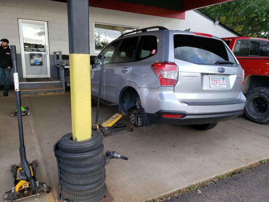 A Subaru Forester has a flat tire