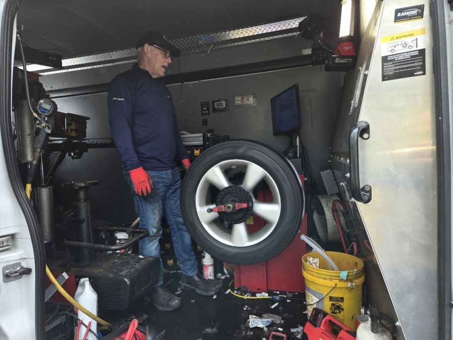 Goodyear Assurance MaxLife2 Tire being balanced by Jay Condrick of Boston Mobile Tire