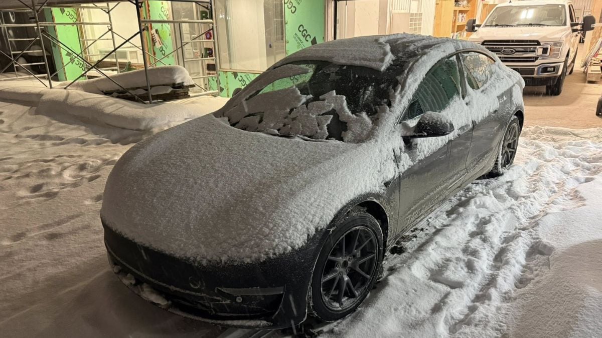Jordan's Tesla Model 3 all covered with freezing snow