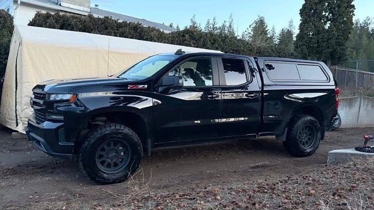 Jordie Livingstone's 2021 Chevy Silverado parked in his Minnesosta home's driveway with 90,000 miles before the engine failure