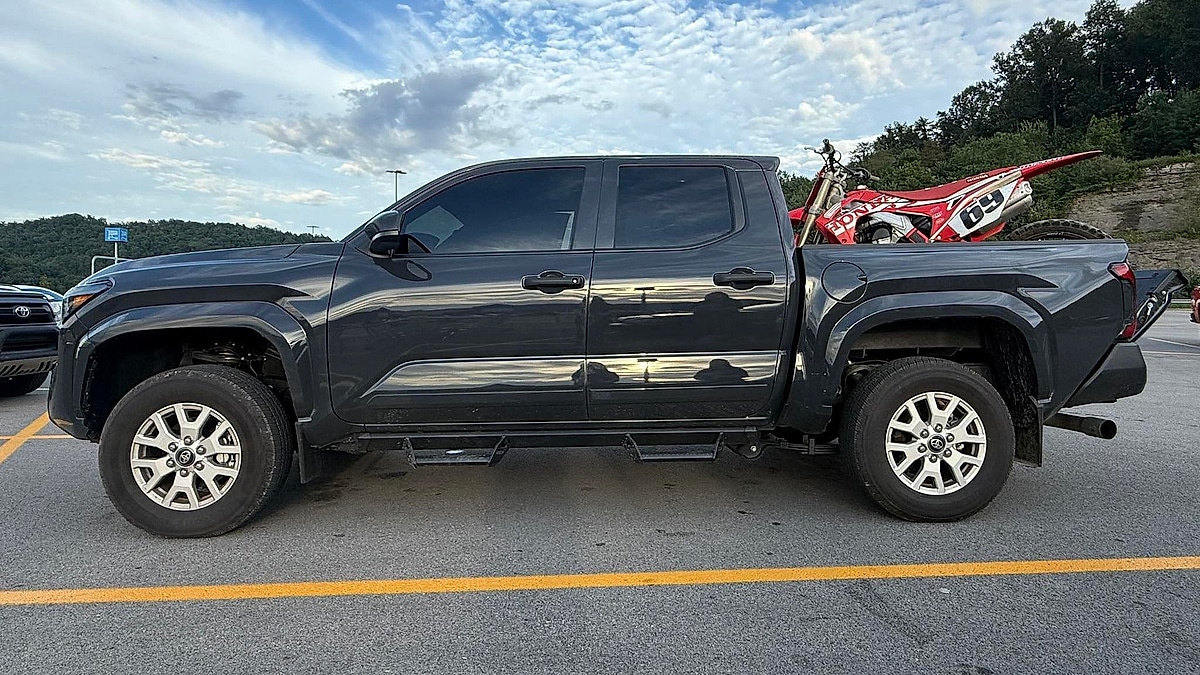 Kentucky owner's 2025 Toyota Tacoma undergoes monitoring for cold-start transmission slipping and 1st-to-3rd gear shifting failures in a driveway