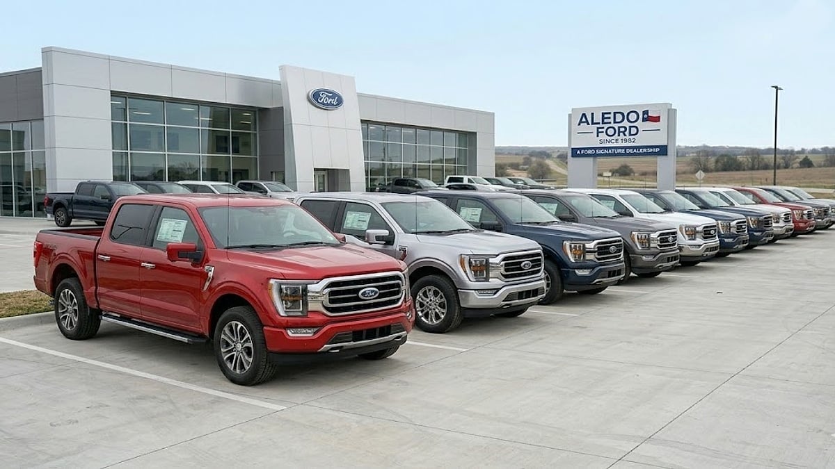 Lineup of 2025 Ford F-150 trucks at Aledo Ford dealership, showcasing diverse trims and inventory for Texas truck buyers