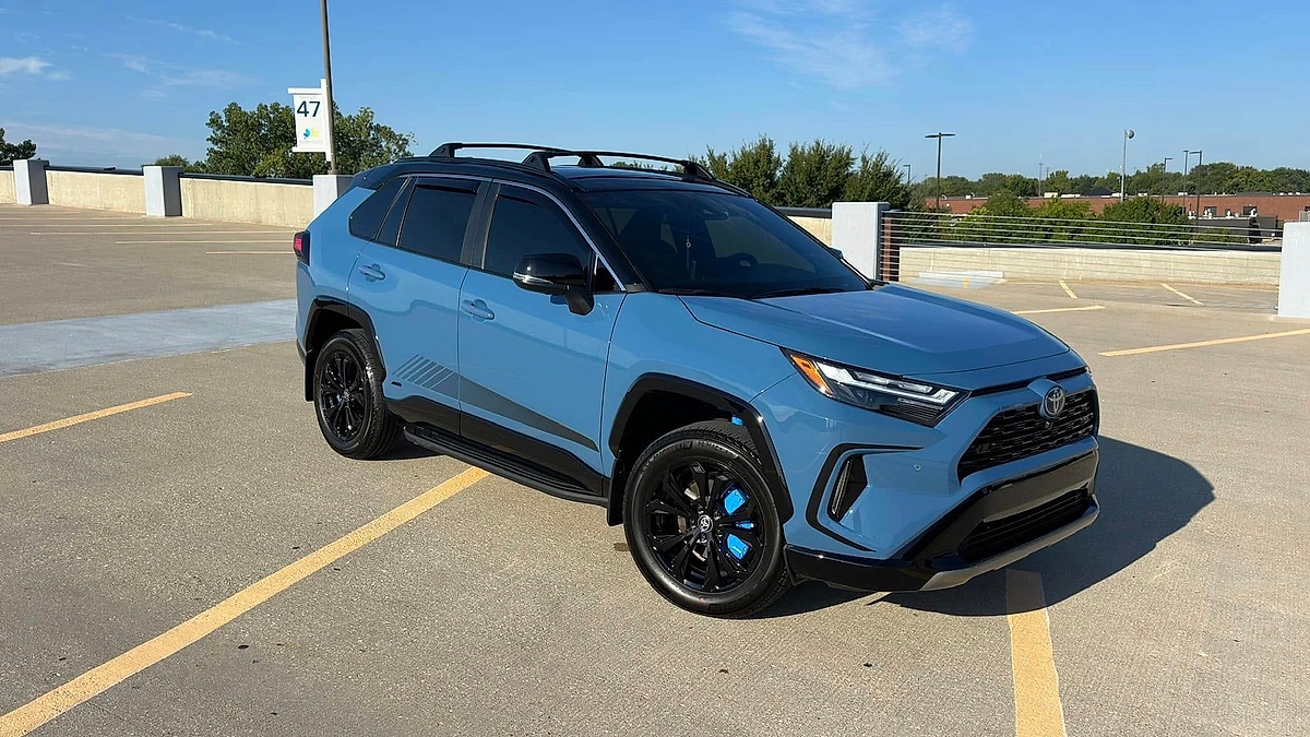 Marcus Maekawa's Cavalry Blue 2024 Toyota RAV4 in a Kansas parking lot