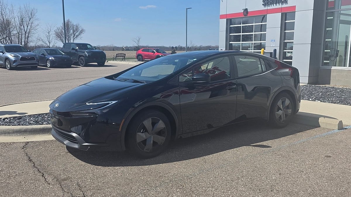 Michigan mobile notary Jodi Brown's 2025 Prius AWD LE, at the Toyota dealer after her purchase