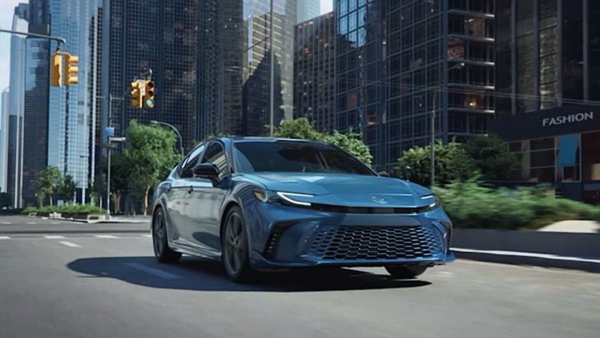 New Toyota Prius riding in a city