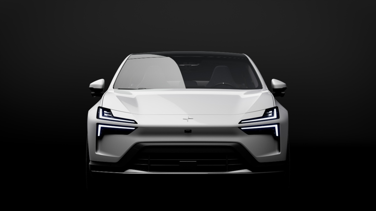 White Polestar electric vehicle with distinctive LED headlights against dark background, front view.