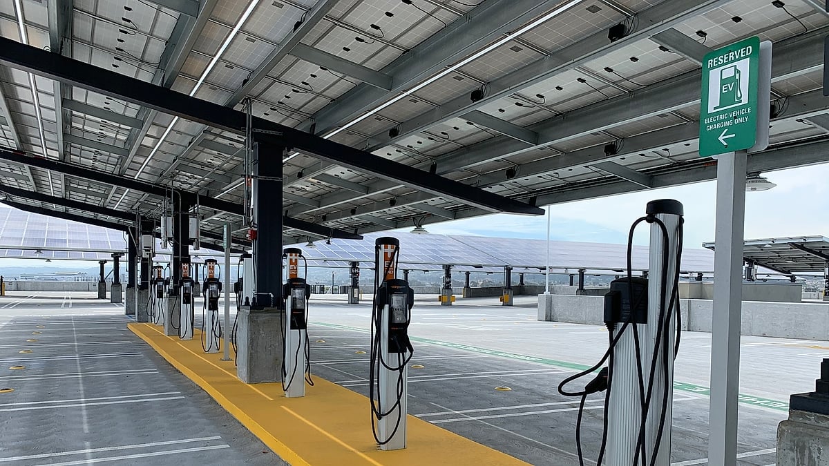 Public EV chargers below a solar power roof