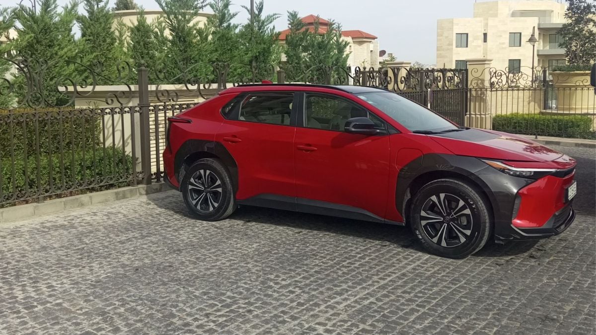 Red and new Toyota bZ4X by Belal Dwaikat, a group member who shared his EV's image in the public group
