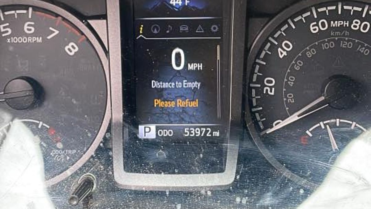 Refuel Please message appears on the 2018 Toyota Tacoma Screen after the owner changes oil.