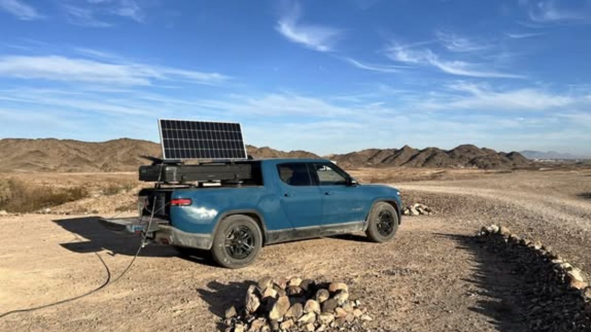 Rivian R1T with solar panels in the back