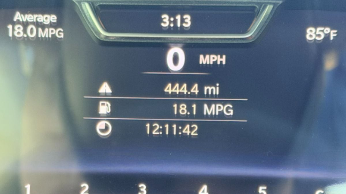Ram 1500 dashboard showing 0 MPH, 444.4 miles traveled, 18.1 MPG, and time 3:13. Temperature reads 85°F, with an average MPG of 18.0.