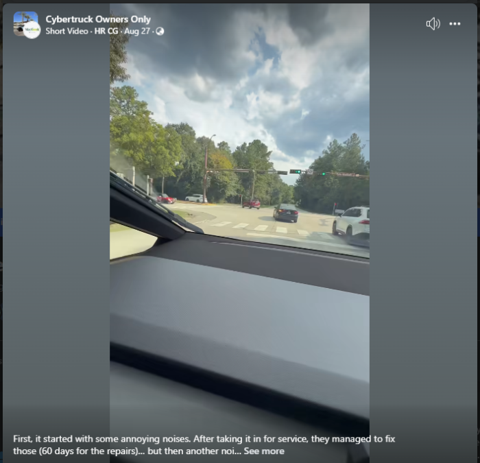 View from inside a vehicle at an intersection, showcasing cloudy skies and a line of cars waiting at a traffic light.