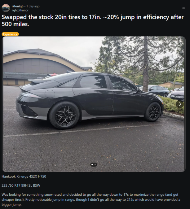 A sleek black car parked, showcasing new 17-inch Hankook tires, highlighting improved efficiency after a recent tire swap.