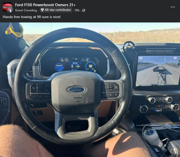 Ford F-150 interior showing steering wheel, digital gauge cluster, and hands-free towing assist active at 90 mph on highway.